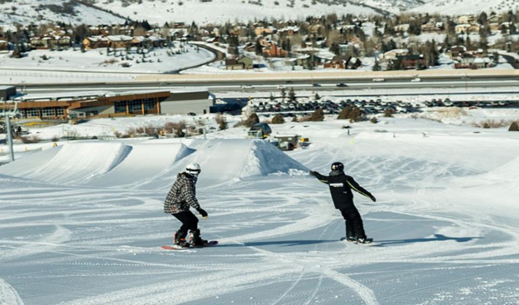 Snowboard coaching session at Woodward Park City